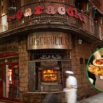 El restaurante del barrio Gótico de Barcelona que cumple 190 años famoso por su pollo rustido con madera de encina