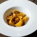 Raviolis, tagliolini y carnes de más de 50 euros: el italiano que rompe la regla de la pasta en Madrid
